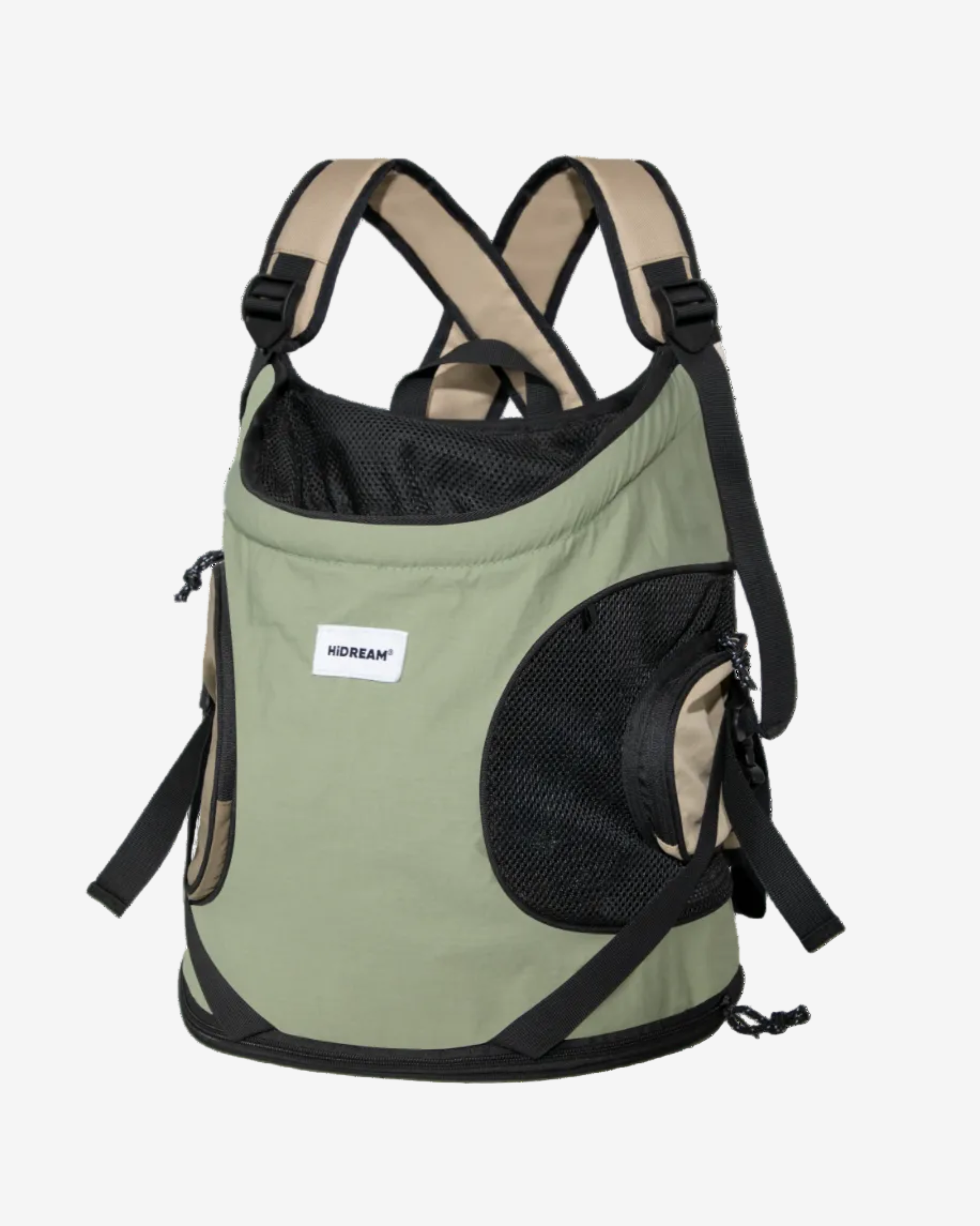 A front pet carrier backpack with beige and black colors, featuring padded straps and a mesh window for the pet.