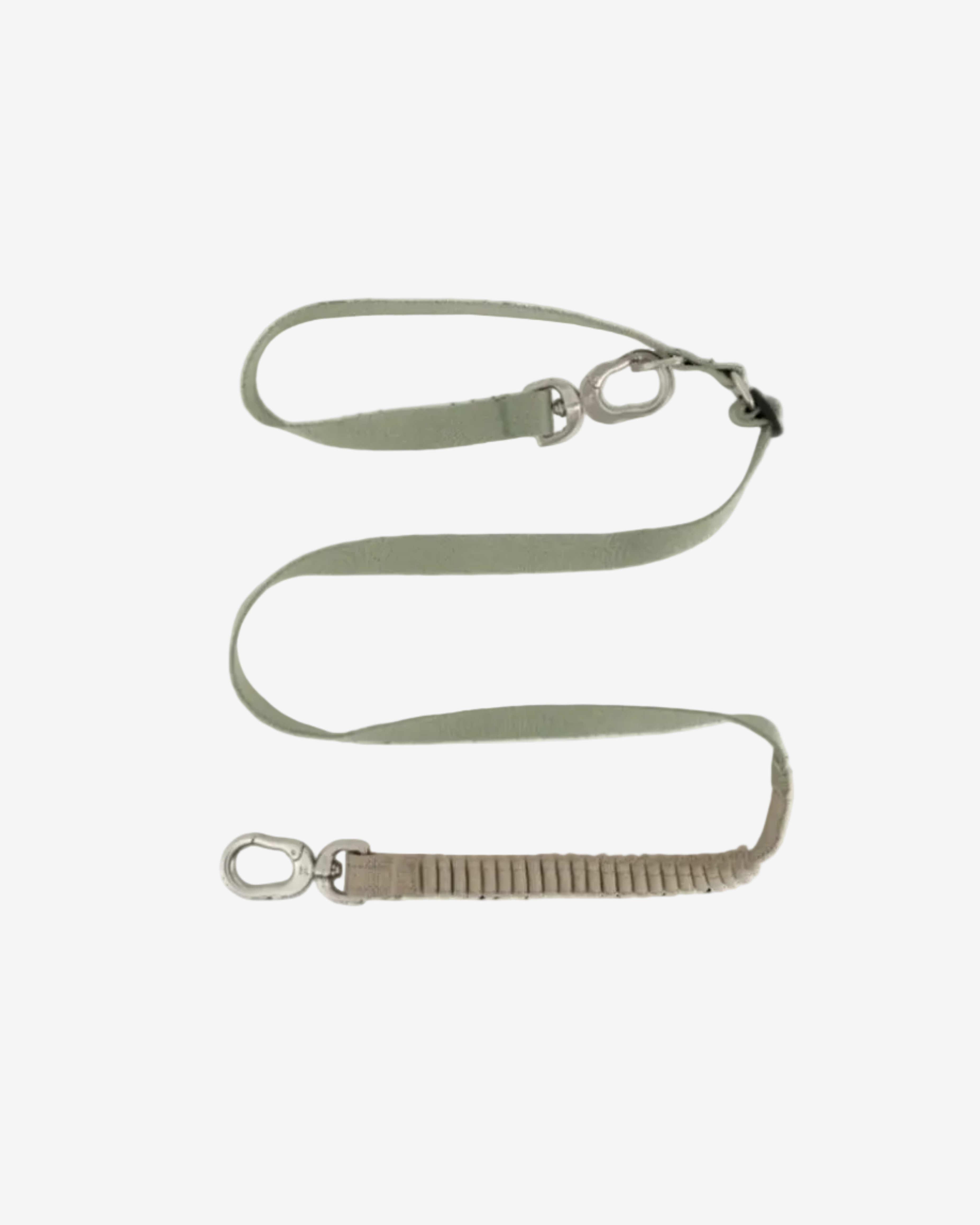A silver-colored anti-pull multi-functional dog leash with a bungee section and metal clasps.