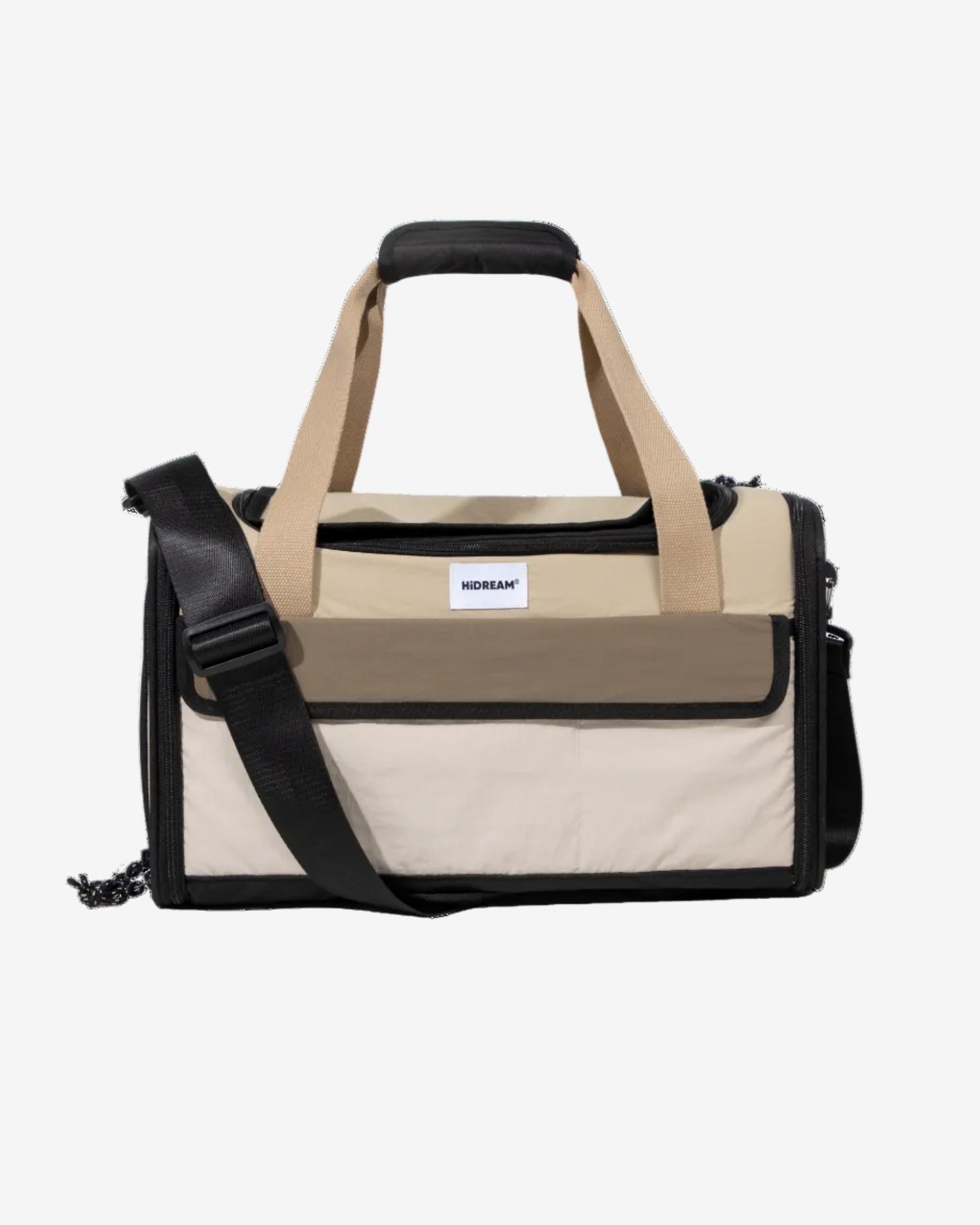 A beige and black pet travel tote bag with straps and a black lining, designed to be under airplane seats.