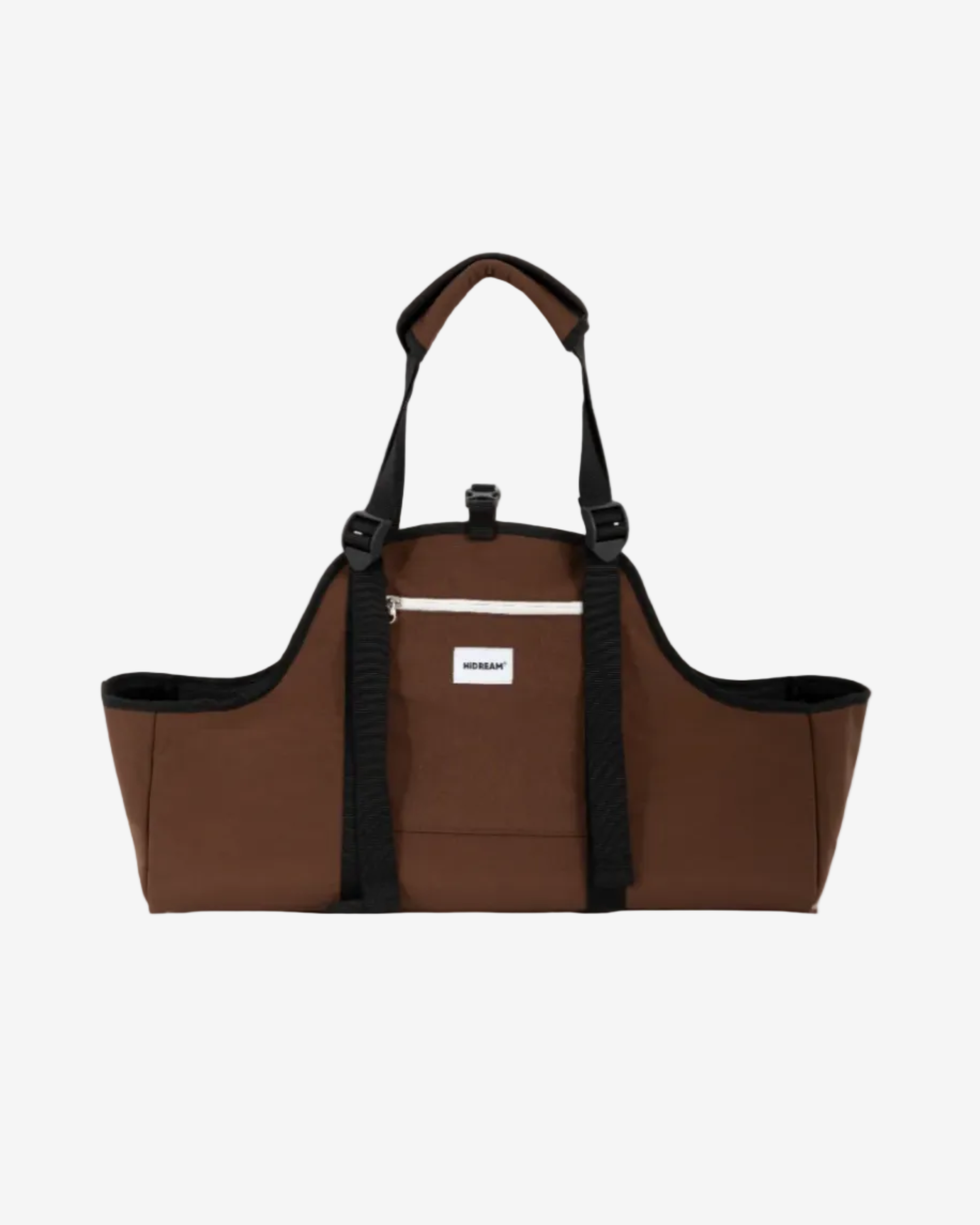Brown Dachshund carrier with black straps on a white background